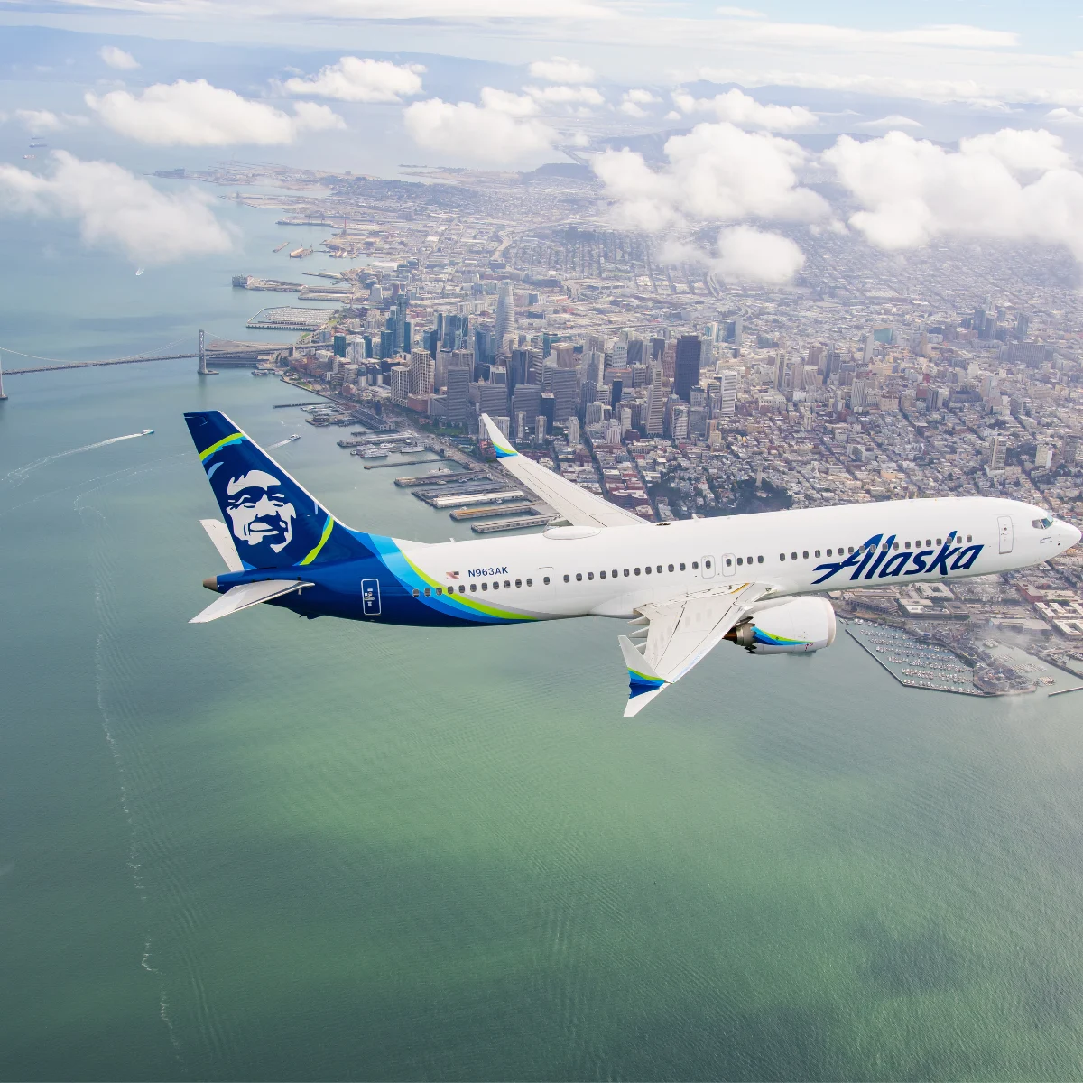 Alaska Airlines aircraft flying over San Francisco Bay